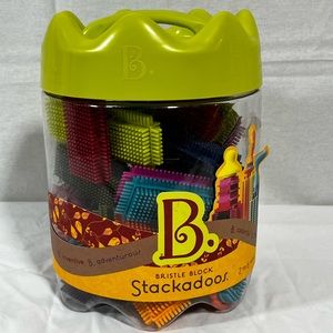 B. TOYS - BRISTLE BLOCKS STACKADOOS BUILDING BLOCKS - 45 OUT OF 68 PIECES.
